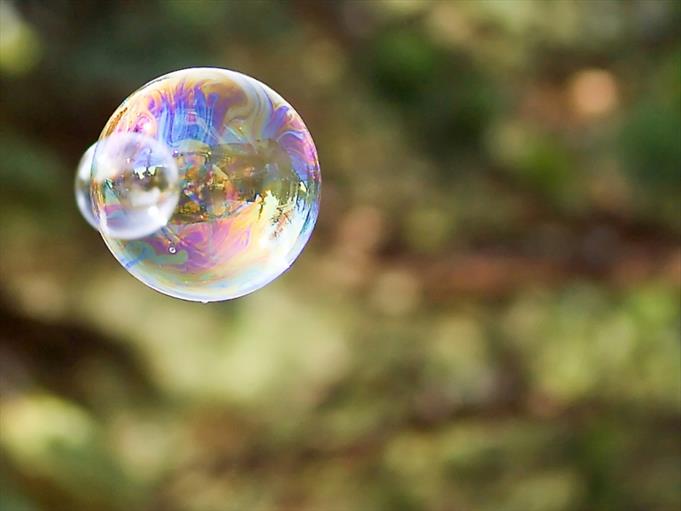 Nieuwe zeepbellen op de internationale huizenmarkt image